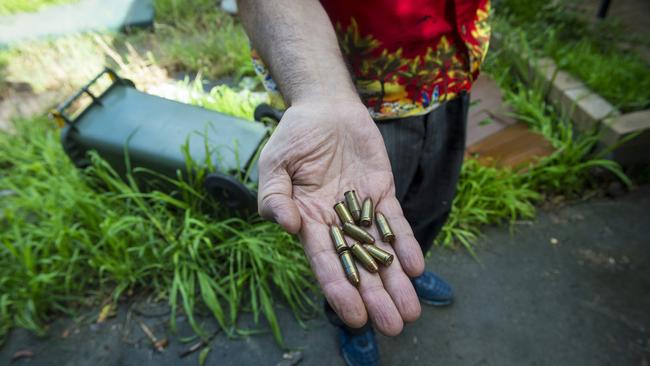 Enzo Condello brother of slain gangland figure Mario Condello holding bullets found in the house. Picture: Eugene Hyland