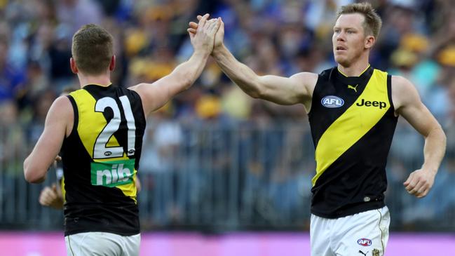 Jack Riewoldt (right) is congratulated by Jacob Townsend at Optus Stadium after a goal. Picture: AAP.