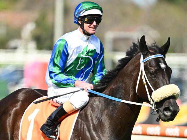 MELBOURNE, AUSTRALIA - SEPTEMBER 23: Luke Nolen riding I Wish I Win gallops in between races during Melbourne Racing at Caulfield Racecourse on September 23, 2023 in Melbourne, Australia. (Photo by Vince Caligiuri/Getty Images)