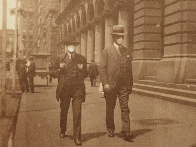 People wearing masks in Sydney during the Spanish flu epidemic of 1918-1919ca. Picture: State Library