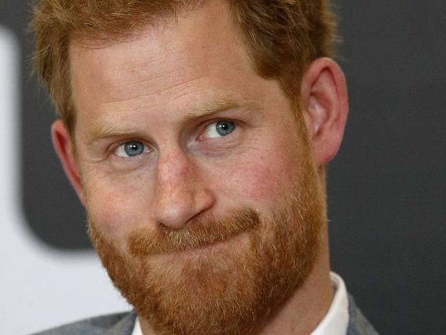 (FILES) In this file photo taken on April 03, 2019 Britain's Prince Harry, Duke of Sussex smiles during a discussion, while on a visit to YMCA South Ealing in west London to learn more about their work on mental health and see how they are providing support to young people in the area. - Britain's Prince Harry announced on April 10, 2019, that he is teaming up with US celebrity talk show host Oprah Winfrey on a documentary series for Apple about mental health. The Duke of Sussex, who is set to become a father this month, will jointly create and executive produce the upcoming mental health-themed show with Winfrey, according to Kensington Palace, his official residence. (Photo by Adrian DENNIS / POOL / AFP)