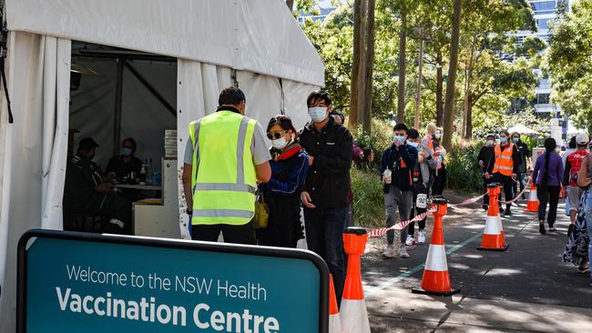 Members of the public line up at Sydney’s Olympic park vaccine centre. Picture: NCA NewsWire / Flavio Brancaleone