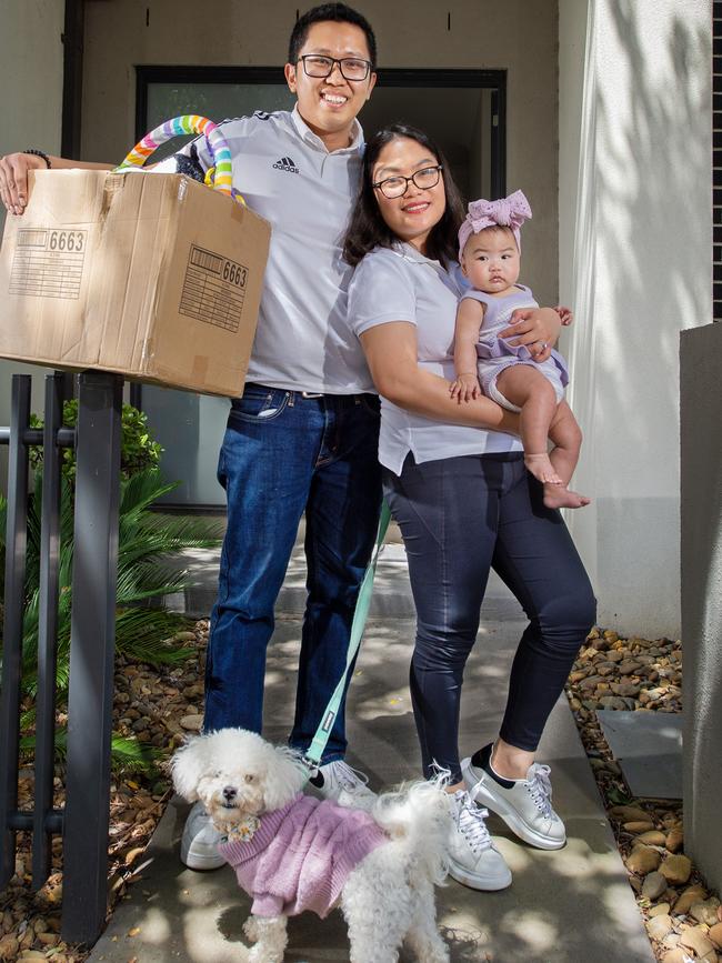 Adrio and Christina Ricafort, with their six-month-old daughter Adriana and dog Sushi, at their rental home in Lalor. They have bought their first house with plans to move in soon. Picture: Nicki Connolly.