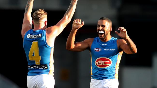 Suns players celebrate their victory. Photo by Matt King/AFL Photos/via Getty Images