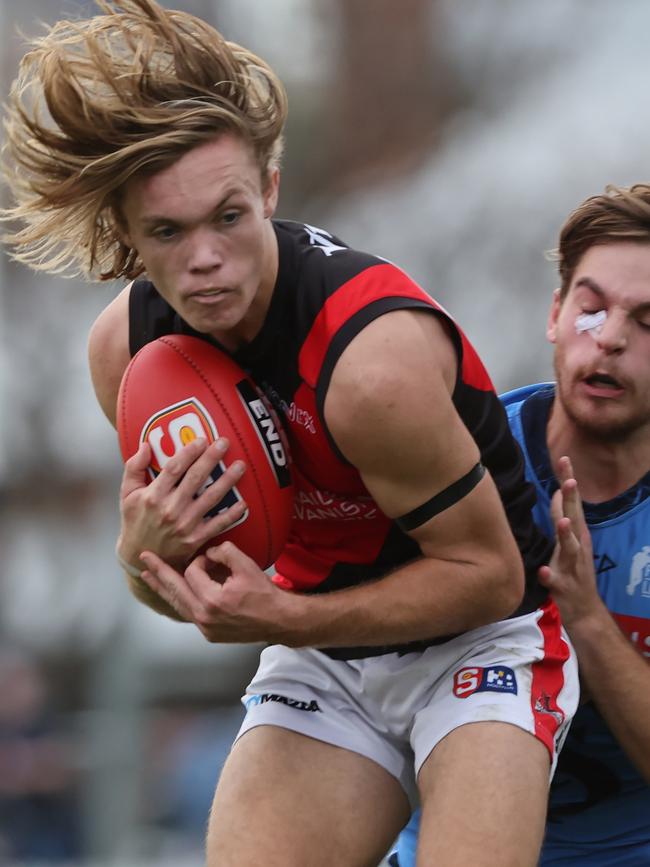 West Adelaide’s Kobe Ryan marks in front of Sturt’s Casey Voss. Picture: David Mariuz/SANFL