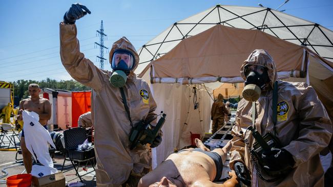 Ukrainian Emergency Ministry rescuers attend an exercise in the city of Zaporizhzhia in case of a possible nuclear incident at the Zaporizhzhia nuclear power plant located near the city. Picture: AFP