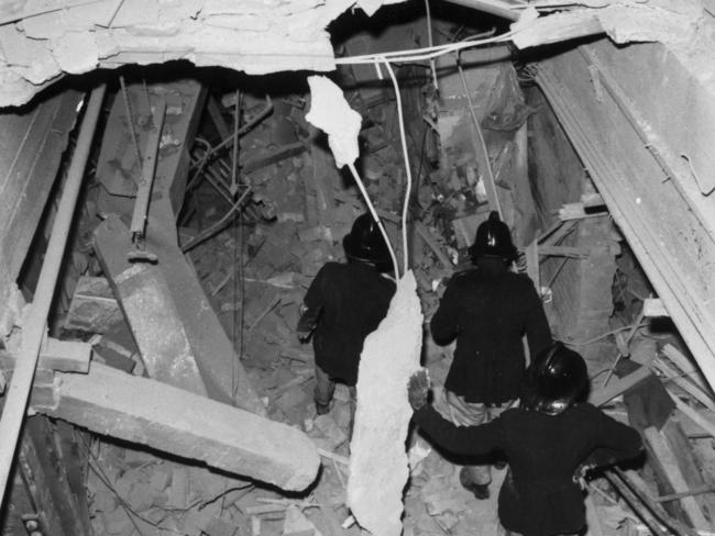 22nd November 1974: Firemen sift through the remains of the pub, The Tavern in the Town' in Birmingham, after it was bombed by the IRA in 1974. Picture: Wesley/Keystone/Getty