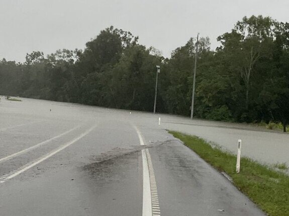 Water over the road due to flooding on the Bruce Hwy between Tully and Cardwell. Picture: QPS