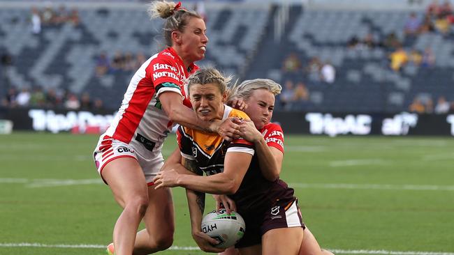 Julia Robinson of the Broncos is bought down in the match against the Dragons last round.