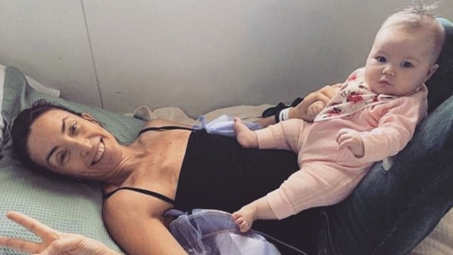 Emma Eckersley the day after her double mastectomy with her daughter. Picture: Supplied