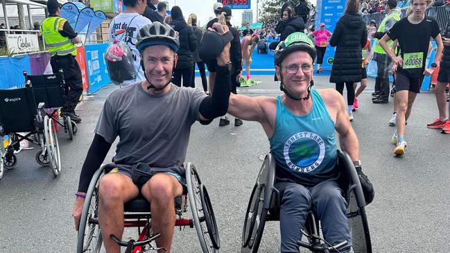 Grant Cunningham and Craig Johnson, who placed third and second in the 4km Wheelchair race, at the 2024 Gold Coast Marathon on Saturday July 6. Photo: Ash Jansen