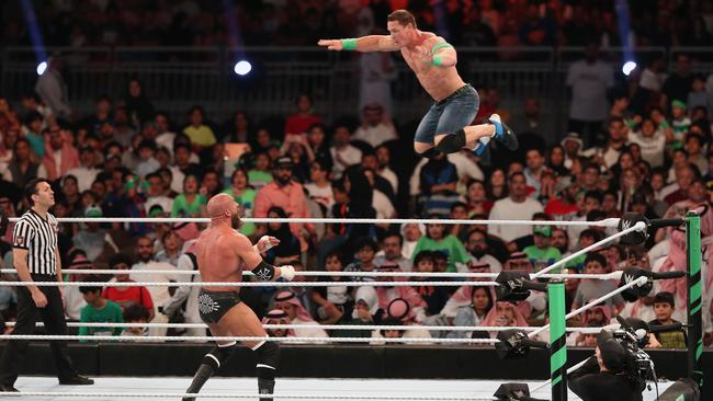 Cena getting the jump on Triple H during the WWE Greatest Royal Rumble event. Picture: AAP