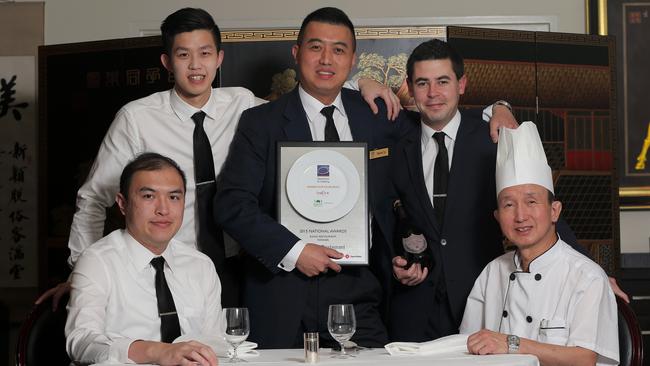 Me Wah staff members Sam Tse, left, Edwin Ho, general manager Stephen Tso, sommelier Damien Byrne and executive chef Gordon Tso.