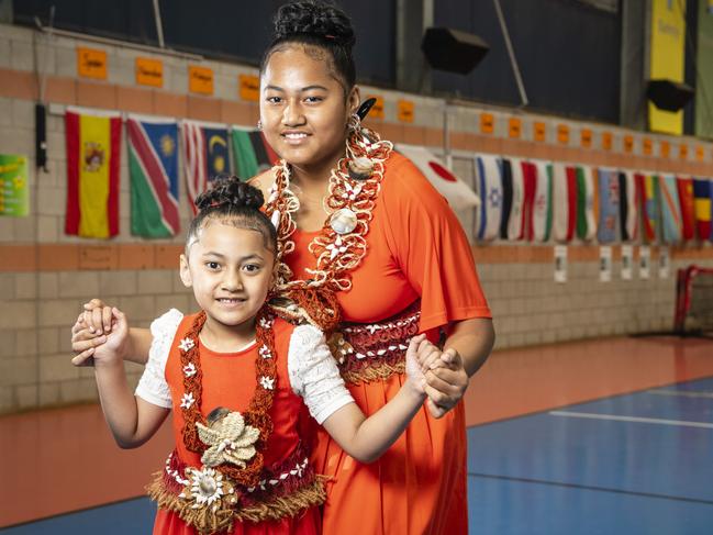 Sisters Tapaita (Yr1) and Hifo (Yr6) Leaaemanu represent Tonga at Harmony Day celebrations at Darling Heights State School. Picture: Kevin Farmer