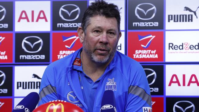 Brett Ratten faces the press. Photo by Darrian Traynor/Getty Images.