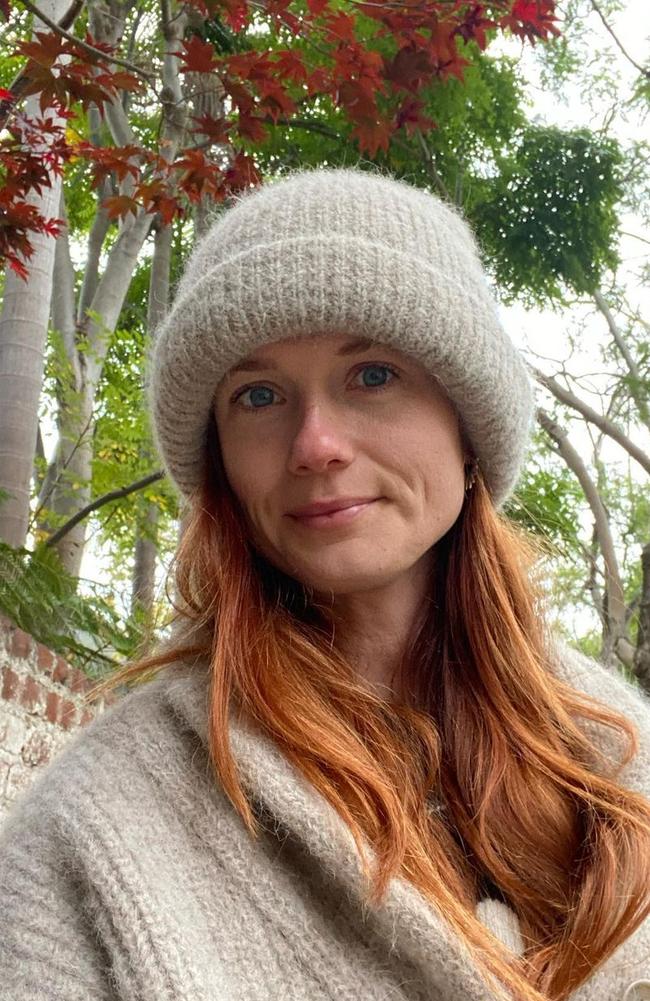 Bonnie Wright is still rocking her signature red locks.