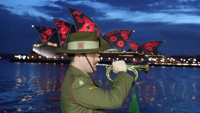 LCPL Justin Williams plays the last post at the dawn service on Thursday. Picture: John Grainger