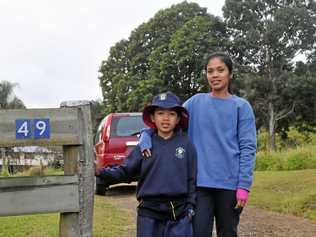 12-year-old Neil Macalisang with his mother Milaflor Rushton. Picture: Josh Preston