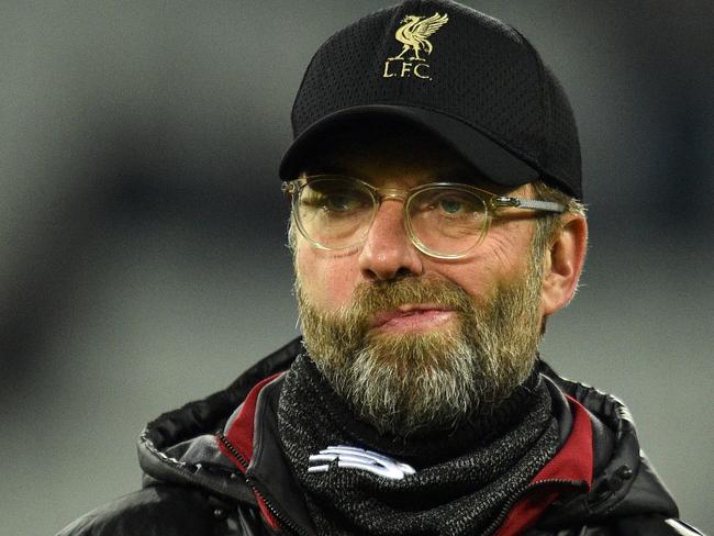 Liverpool's German manager Jurgen Klopp reacts ahead of the English Premier League football match between West Ham United and Liverpool at The London Stadium, in east London on February 4, 2019. (Photo by Glyn KIRK / AFP) / RESTRICTED TO EDITORIAL USE. No use with unauthorized audio, video, data, fixture lists, club/league logos or 'live' services. Online in-match use limited to 120 images. An additional 40 images may be used in extra time. No video emulation. Social media in-match use limited to 120 images. An additional 40 images may be used in extra time. No use in betting publications, games or single club/league/player publications. /