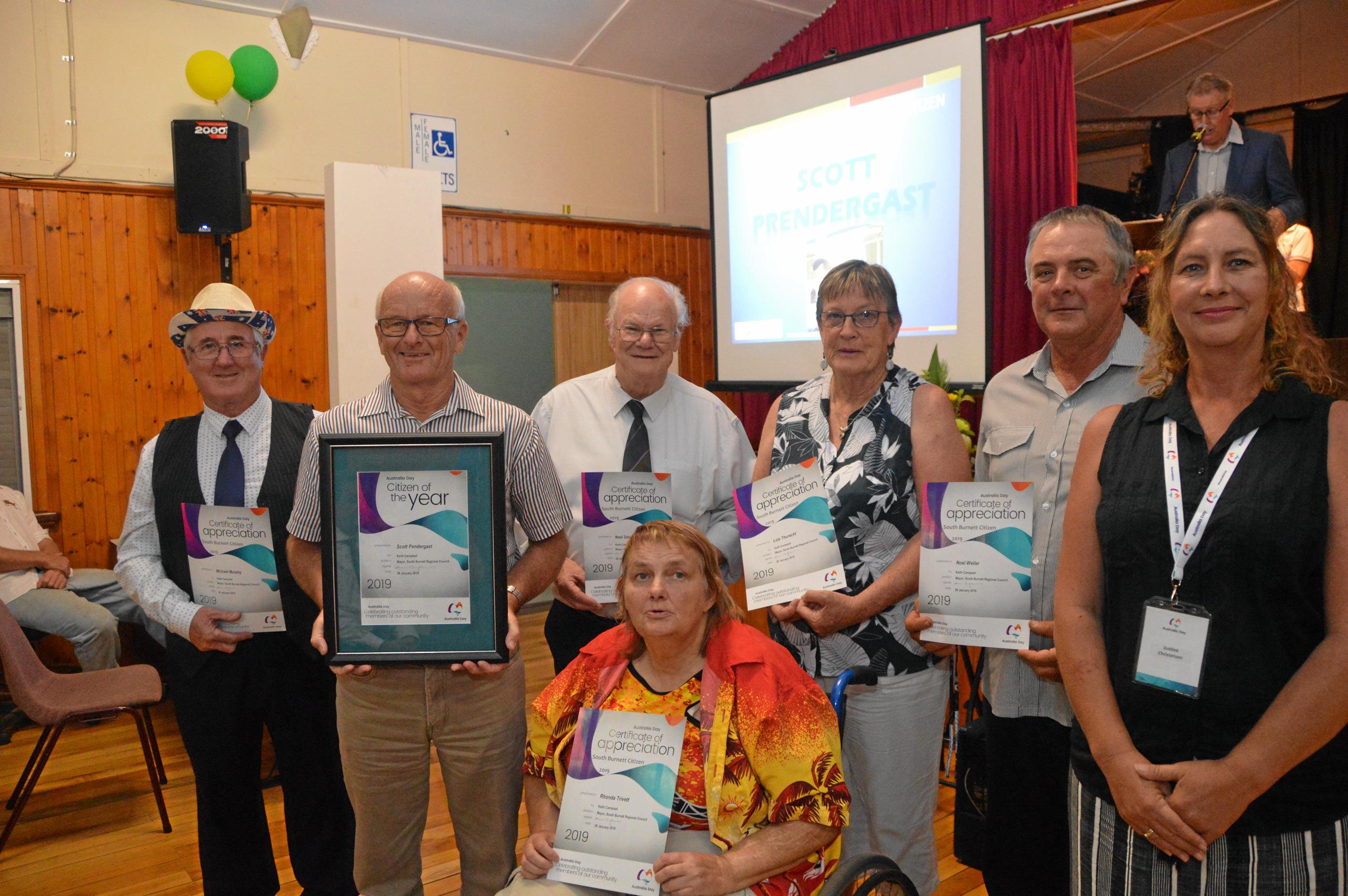 Graham Prendergast accepting the South Burnett citizen of the year award on behalf of hgis son Scott with nominees at the South Burnett Australia Day awards 2019. Picture: Claudia Williams