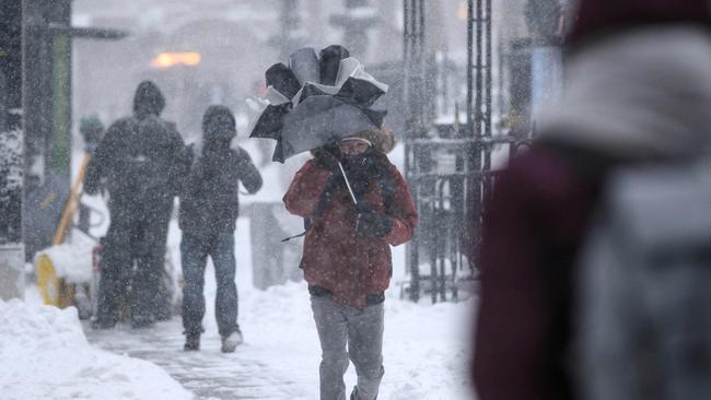 Battling the blizzard in New York on Saturday. Picture: AFP