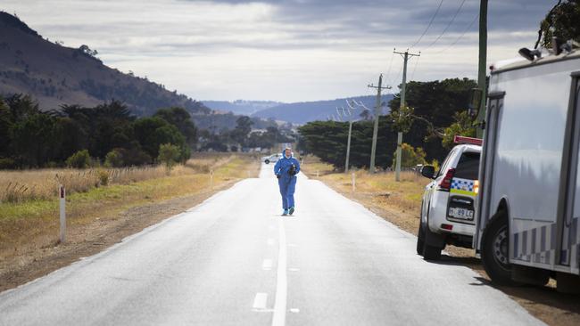 Colebrook Rd remained closed today after the body of a young man was found by the roadside with a gunshot wound to the head early on Sunday. Picture: RICHARD JUPE