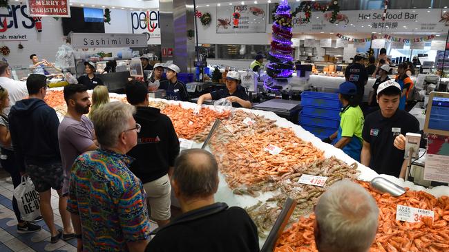 Large crowds buying their Christmas Day seafood during the annual 36-hour seafood marathon at Sydney Fish Market last year.