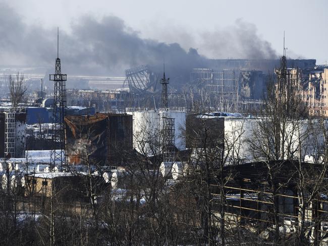 Under attack ... smoke rises over the Donetsk airport in eastern Ukraine. Picture: AP