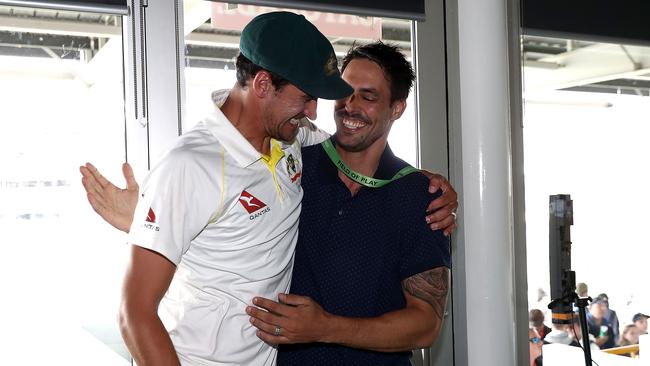 Mitchell Starc is congratulated by former Test quick Mitchell Johnson after the Test.