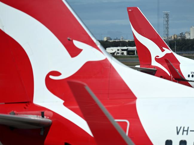 BRISBANE, AUSTRALIA - NewsWire Photos - AUGUST 11, 2022. Qantas planes at Brisbane airport. Industrial action will start at Qantas and budget offshoot Jetstar by the end of August amid an escalating fight over pay with its licensed engineers.Picture: NCA NewsWire / Dan Peled