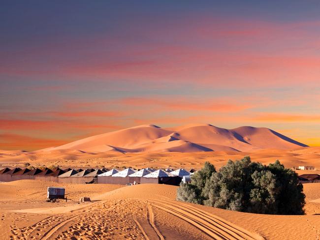 Family adventure holidays are on the riseCamp site over sand dunes in Merzouga, Sahara desert, Morocco, Africa