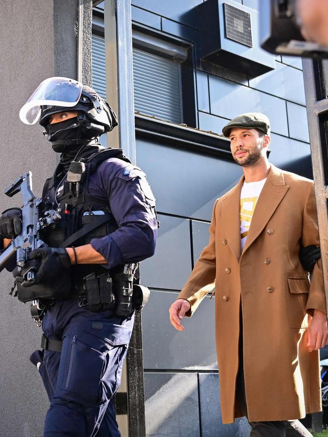 Tristan Tate is brought in for questioning after the raid on the brothers’ home in August 2024. Picture: AFP