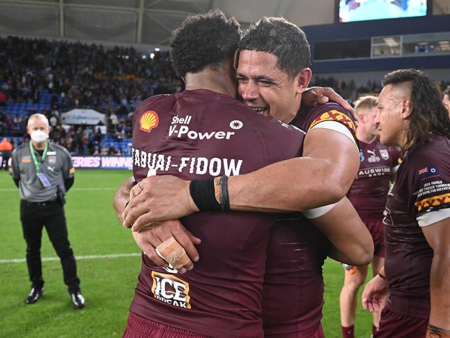 GOLD COAST, AUSTRALIA - JULY 14:  Hamiso Tabuai-Fidow of the Maroons and Dane Gagai of the Maroons celebrate winning game three of the 2021 State of Origin Series between the New South Wales Blues and the Queensland Maroons at Cbus Super Stadium on July 14, 2021 in Gold Coast, Australia. (Photo by Bradley Kanaris/Getty Images)