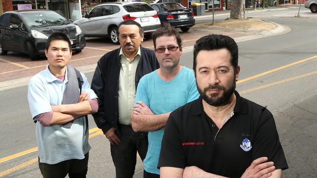 High Street traders Simon Alan (front) and Harry Huang, N Noor and Glenn Morris. Picture: Hamish Blair