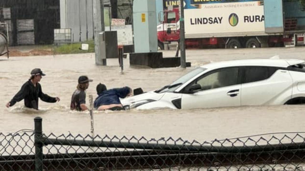 Despite road closures, cars have been spotted trying to traverse flood waters in Tully, south of Cairns. Picture: Alannah Dansie/ Facebook