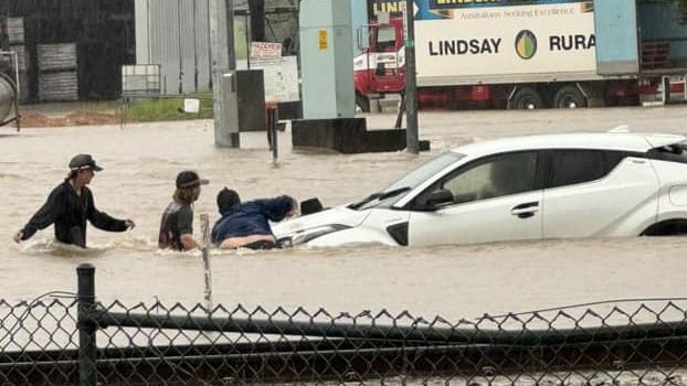 Despite road closures, cars have been spotted trying to traverse flood waters in Tully, south of Cairns. Picture: Alannah Dansie/ Facebook