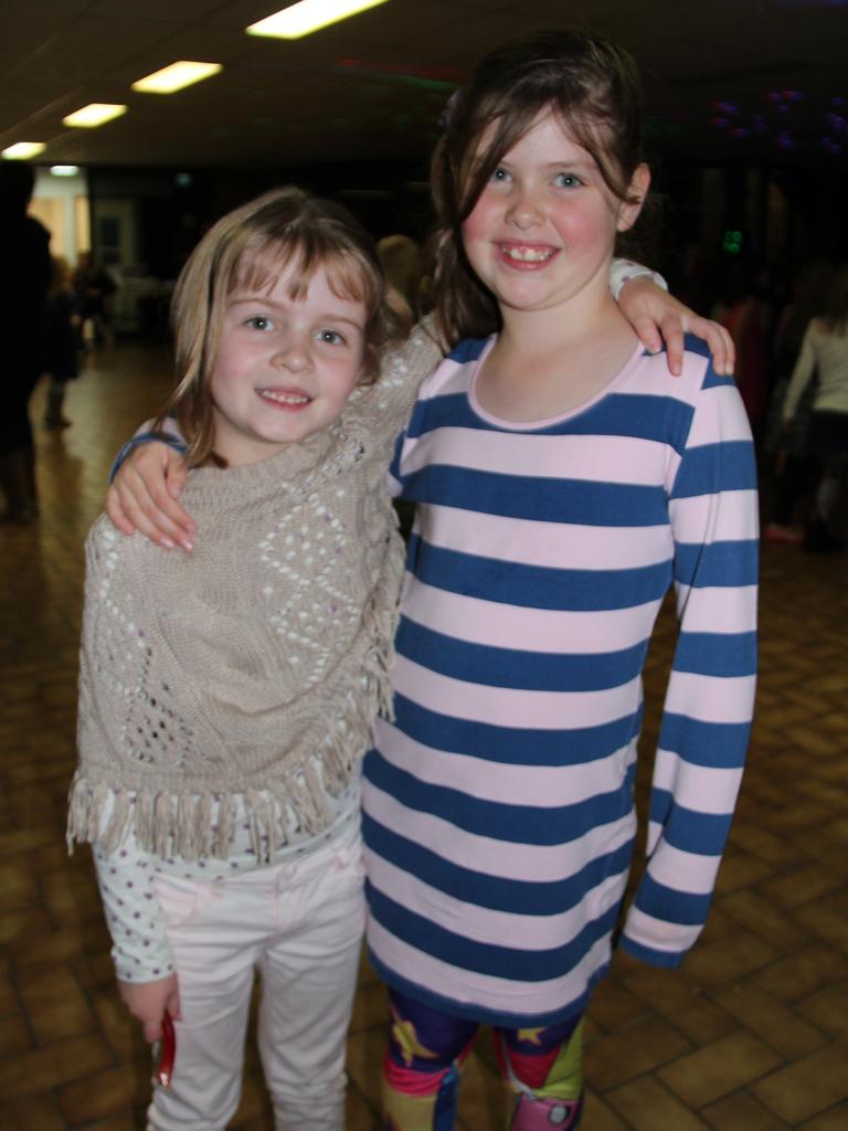 Courtney Tomkins and Ella McGlashan had a great time together at the Blue Light Disco on Friday night Photo Erin Smith / Stanthorpe Border Post