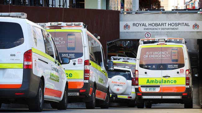 Ramped ambulances line up outside the Royal Hobart Hospital emergency entrance. Picture: NIKKI DAVIS-JONES