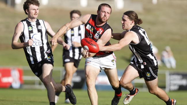 Lauderdale skipper Nat Franklin breaks away from Glenorchy’s Connor Ling. Picture: Nikki Davis-Jones