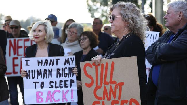 Rosanne Broedelet and Karen Brown rallying outside Brisbane Airport Corporation against air aircraft noise. Picture: Tara Croser.