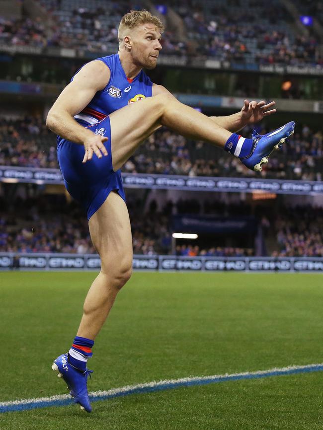 Jake Stringer kicks the winning point with 40 seconds to go. Picture: Michael Klein