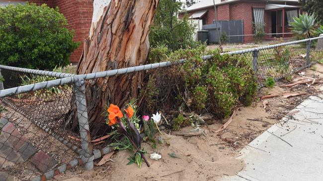Flowers left at the scene of the death in Kilburn. Picture: AAP/ Keryn Stevens