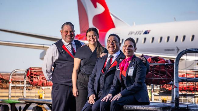 Teen Parliament winner Jordy Harvey dreams of being a flight attendant. Pictured With Qantas flight attendants Michael Williams, Alysia Weetra and Travis Peris. Picture: Tom Huntley