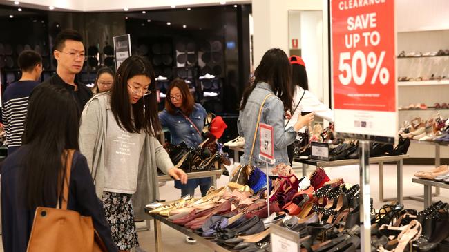 Crowds of customers lined up from early morning to be first through the doors for the clearance items. Picture: Bill Hearne