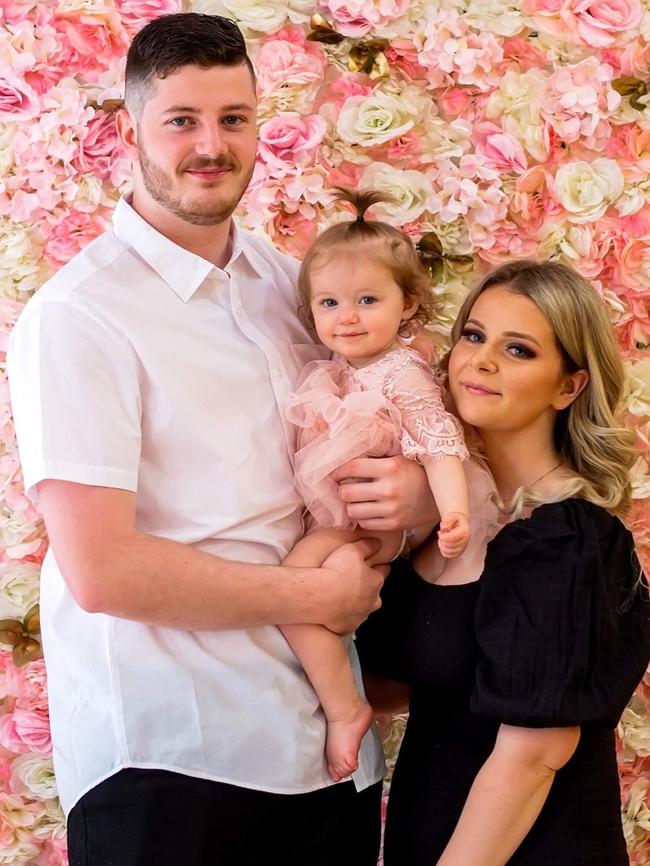 Karlee Mutch, 25, with partner Luke Brander and daughter Evie are desperate for rules at the Lyell McEwin maternity ward to be overturned.