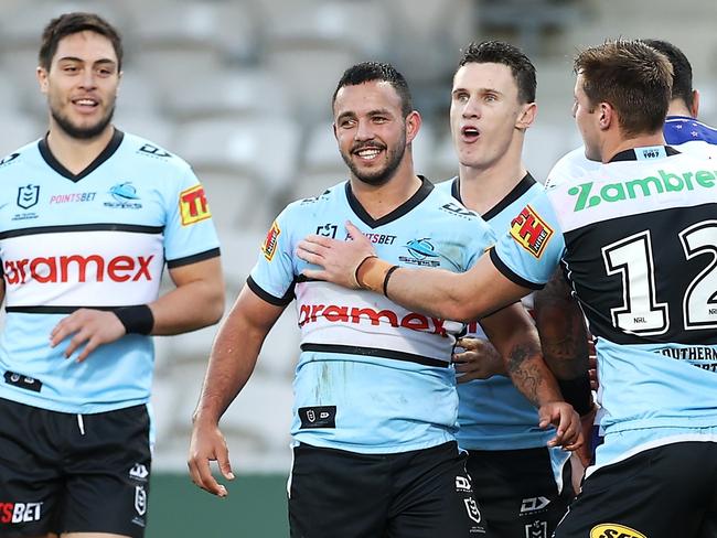 SYDNEY, AUSTRALIA - JULY 11:  Braydon Trindall of the Sharks celebrates with his team mates after scoring a try during the round 17 NRL match between the Cronulla Sharks and the New Zealand Warriors at Netstrata Jubilee Stadium, on July 11, 2021, in Sydney, Australia. (Photo by Mark Kolbe/Getty Images)