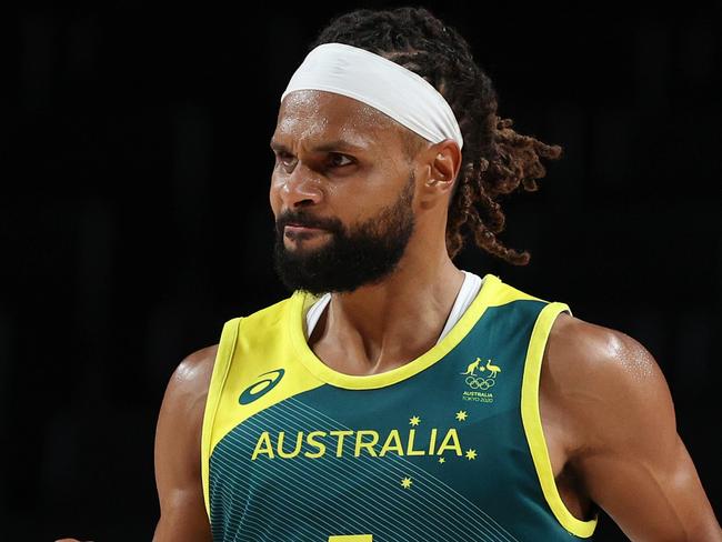 SAITAMA, JAPAN - AUGUST 07: Patty Mills #5 of Team Australia reacts against Team Slovenia during the second half of the Men's Basketball Bronze medal game on day fifteen of the Tokyo 2020 Olympic Games at Saitama Super Arena on August 07, 2021 in Saitama, Japan. (Photo by Kevin C. Cox/Getty Images)