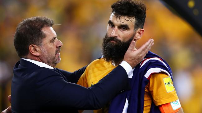 Mile Jedinak and Ange Postecoglou after a World Cup qualifier.