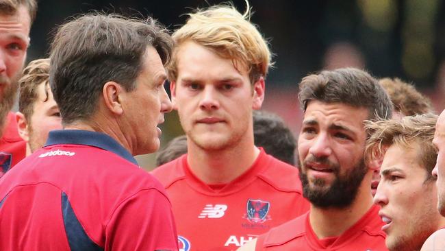 Paul Roos, coach of the Demons speaks to Jack Watts and his players in 2014.