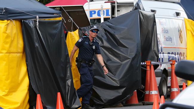 Police at 34 Murray St, Cairns, where 8 children were found murdered. Photographer: Liam Kidston.